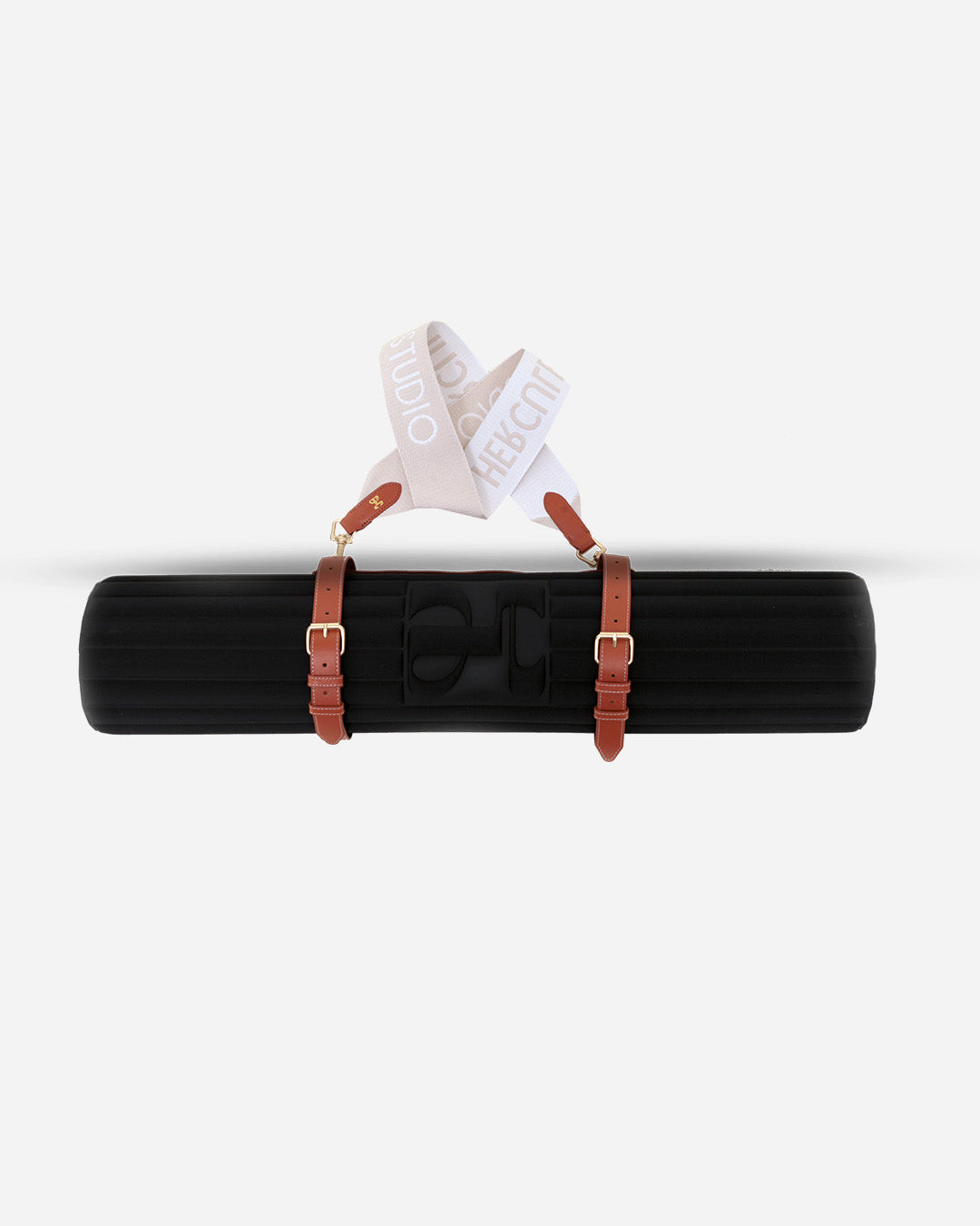 Sangle de transport pour tapis d'exercice modèle soca couleur beige et camel packshot mise en scène