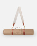 Hercule Studio Dune beige nomad bundle including the ergonomic Archy mat and a chic mat carrying strap for sport mats, ideal for yoga, Pilates and mobility, Made in France product packshot