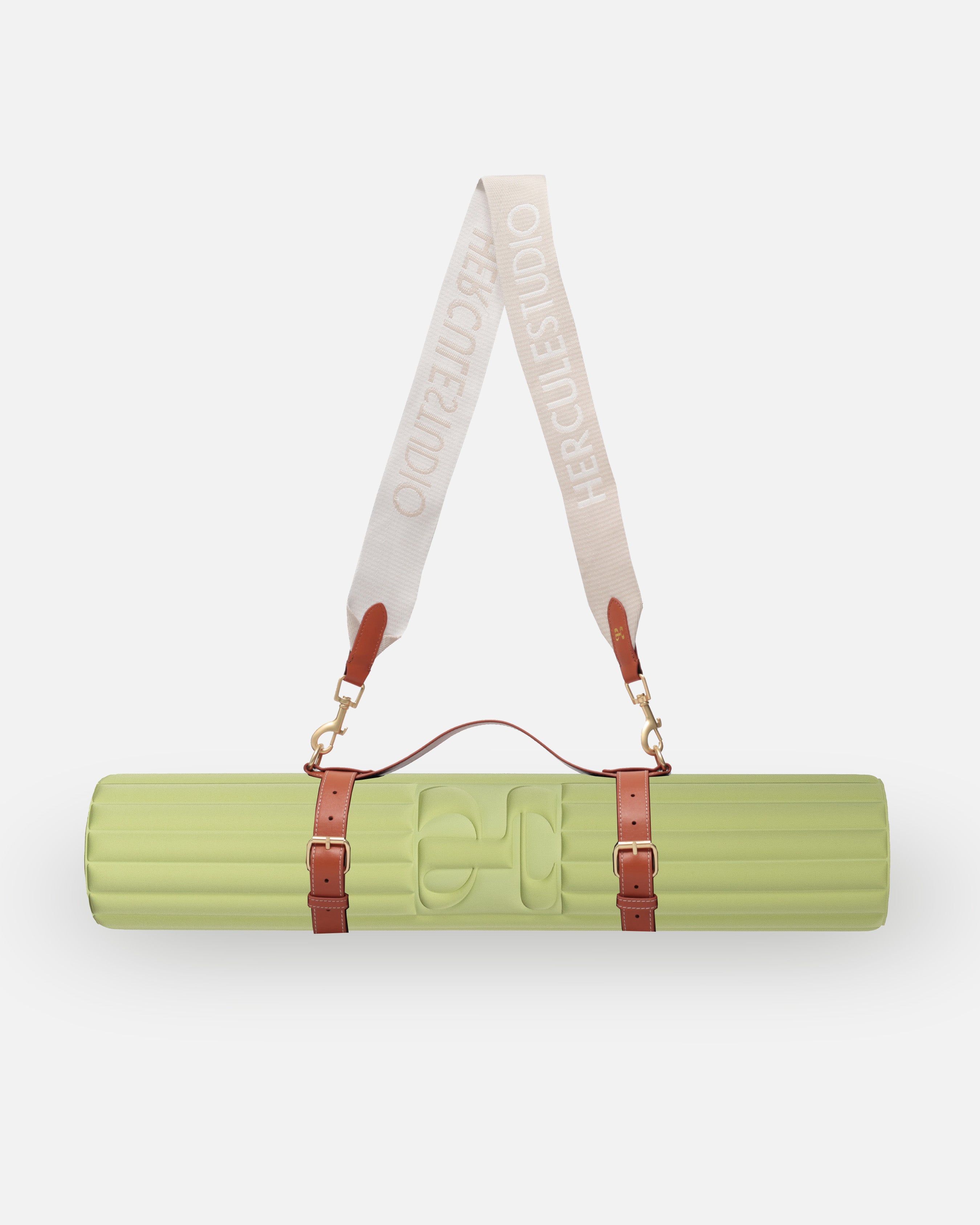 Hercule Studio pistachio green nomad bundle including the ergonomic Archy mat and a mat carrying strap for sport mats, lightweight and functional bundle for Pilates and fitness, French craftsmanship, packshot visual