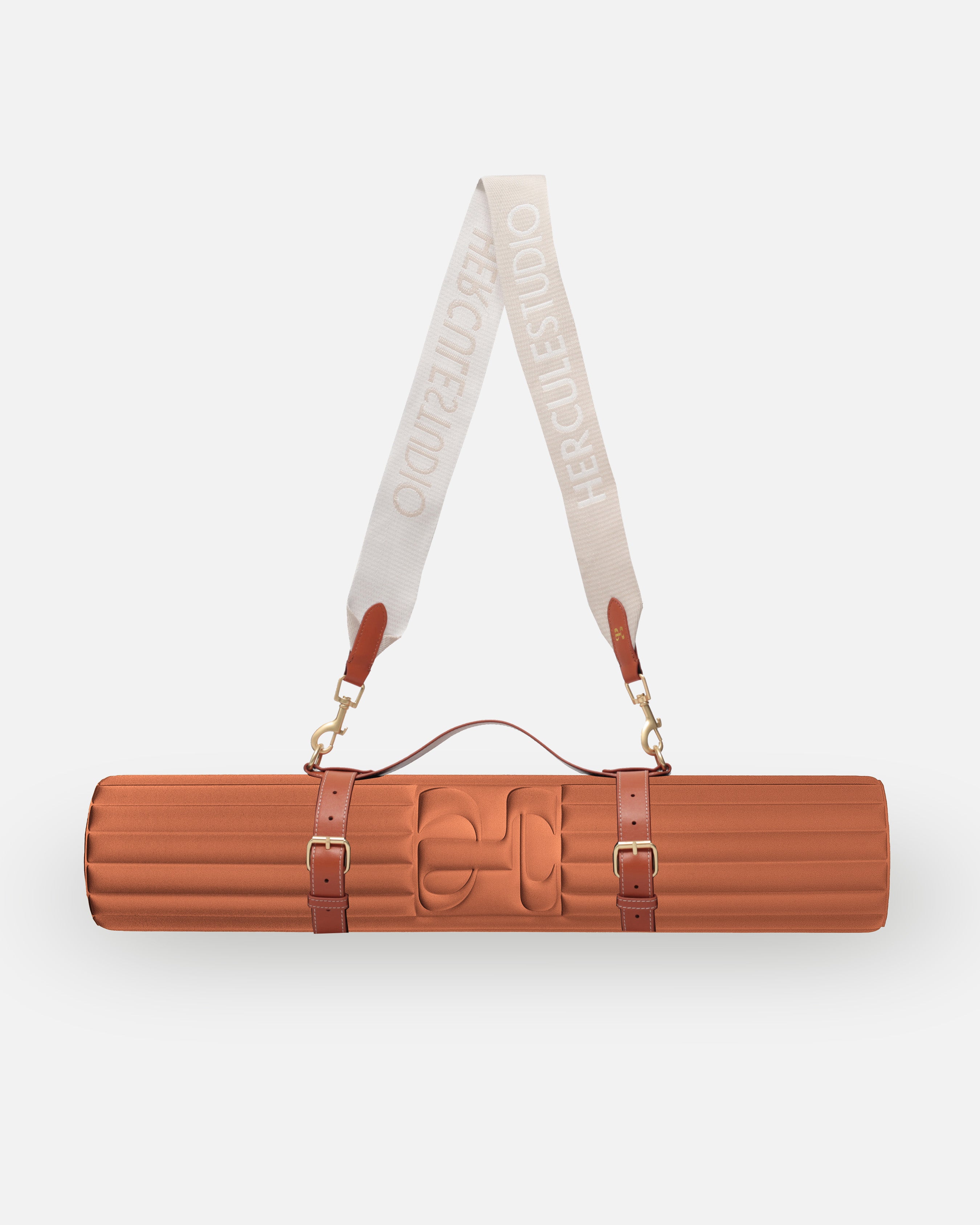 Hercule Studio terracotta nomad bundle with the Archy arch-shaped sport mat and the elegant mat carrying strap, practical solution for Pilates, yoga and fitness on the move, durable Made in France design, duo product packshot