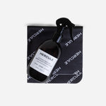 Spray pour assainir le tapis de sport et énergiser l'espace d'entraînement packshot flacon et microfibre