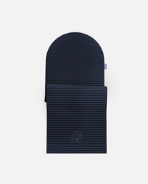 Hercule Studio Archy navy arch-shaped sport mat, durable premium Made in France design mat for fitness, Pilates and stretching, half unrolled view