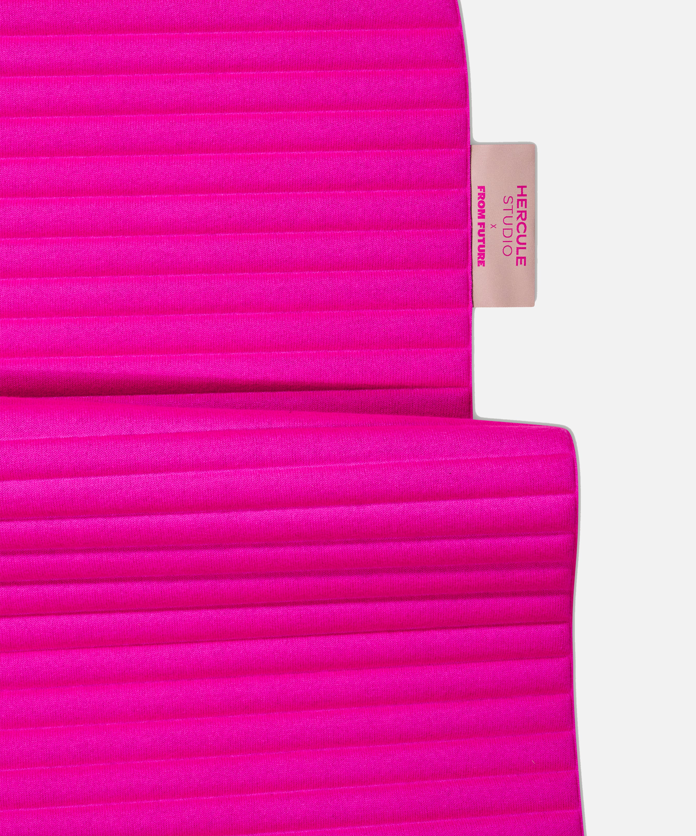 Custom Hercule Studio x From Future label detail on the Candy Pink cashmere sport mat, premium finish