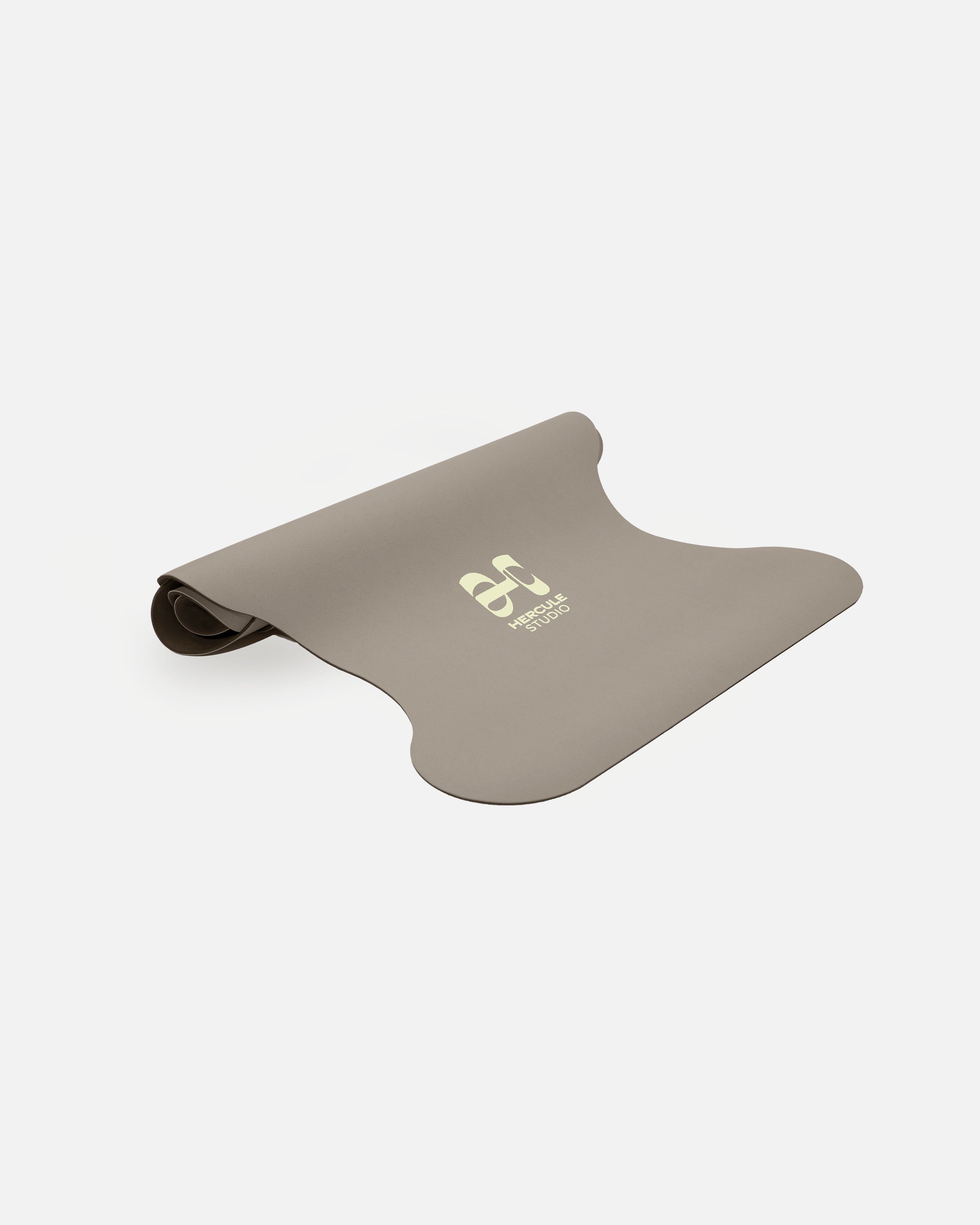 Half-rolled view of the Hercule Studio Greige yoga mat, PVC-free, eco-friendly, comfort and performance for all postures