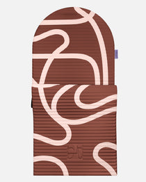 Hercule Studio Archy Bari Choco arch-shaped sport mat, durable premium Made in France design mat for fitness, Pilates and stretching, half unrolled view