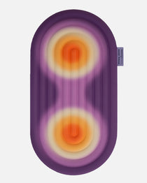 Hercule Studio Galé mini mat unrolled – limited edition Fall in collaboration with Univers Uchronia – purple background with 2 orange circles – portable 3-in-1 comfort pad, ergonomic for knees, elbows, glutes, Pilates/Reformer compatible, durable French design