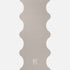 Hercule Studio Greige yoga mat unrolled, beige-grey color, natural rubber PVC-free, high grip for a zen practice