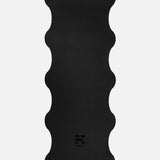 Hercule Studio Midnight Black yoga mat unrolled, natural rubber PVC-free, strong grip for vinyasa and hatha sessions