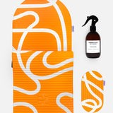 Hercule Studio Bari Orange Pop printed essential bundle with the graphic Archy mat, the Galé 3-in-1 comfort pad and the sport mat sanitizing spray, design and responsible Pilates bundle made in France, product packshot